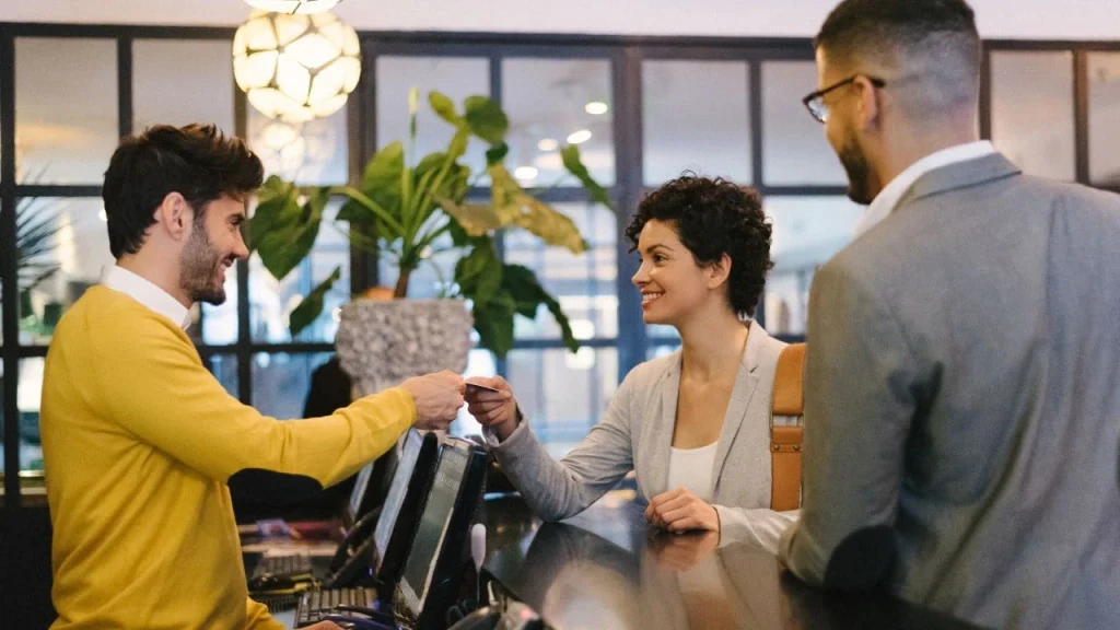 flexible booking options: family checking into hotel room
