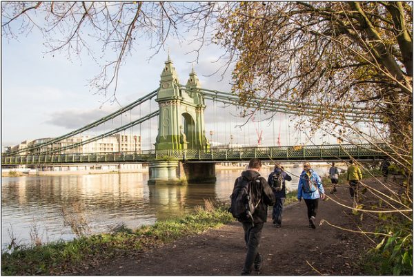 Hammersmith Bridge on the south bank of the Thames Path in London.
