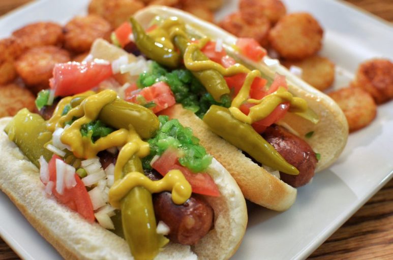Two juicy chicago-style hot dogs with obligatory tator tots. 
