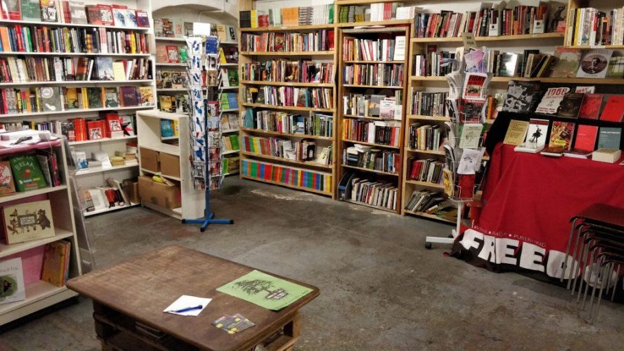 Shelves line the walls filled with books at Freedom Press, an independent bookstore in Whitechapel. 